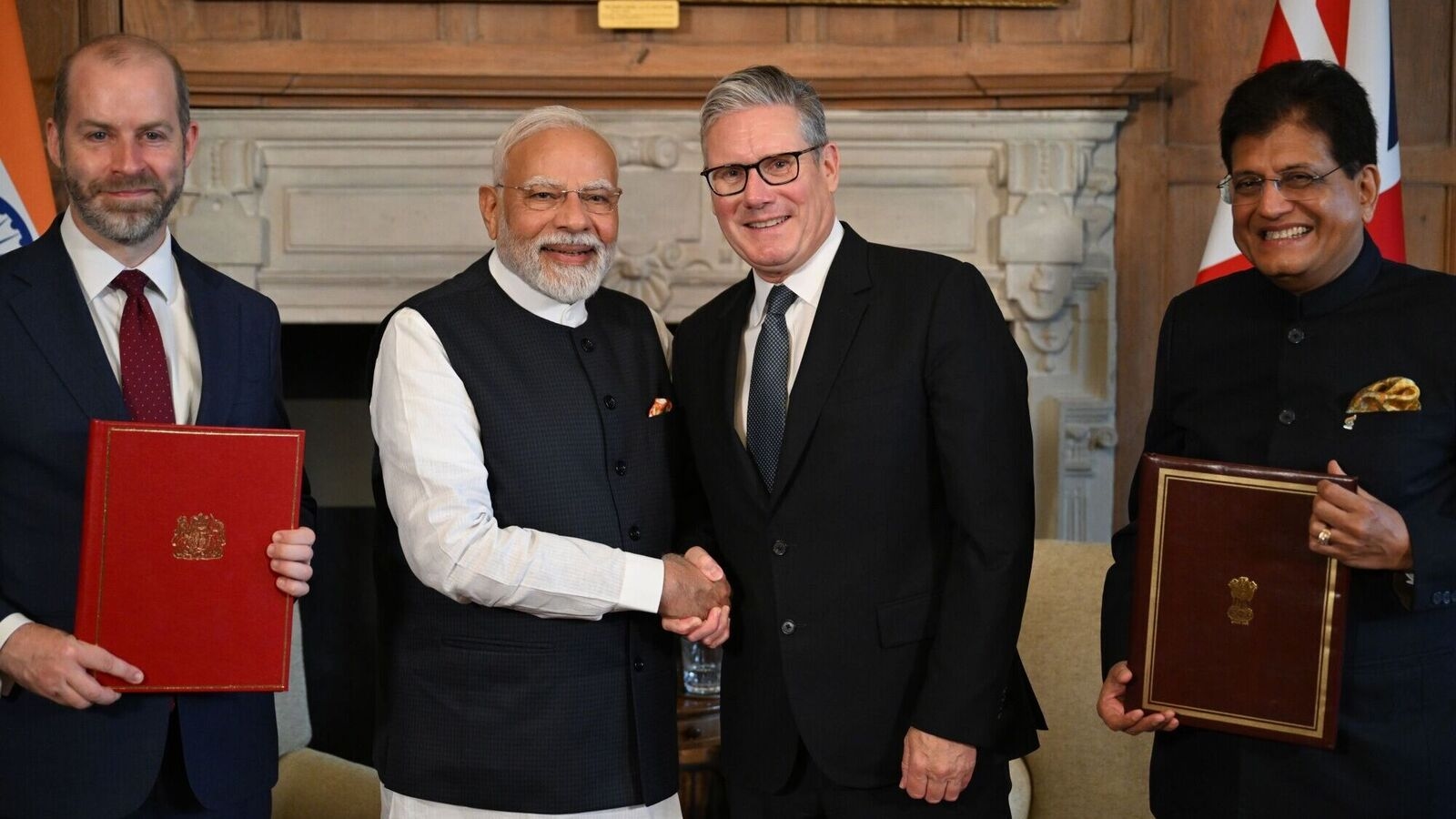 India opens up autos, services, liquor to UK; gains access in goods