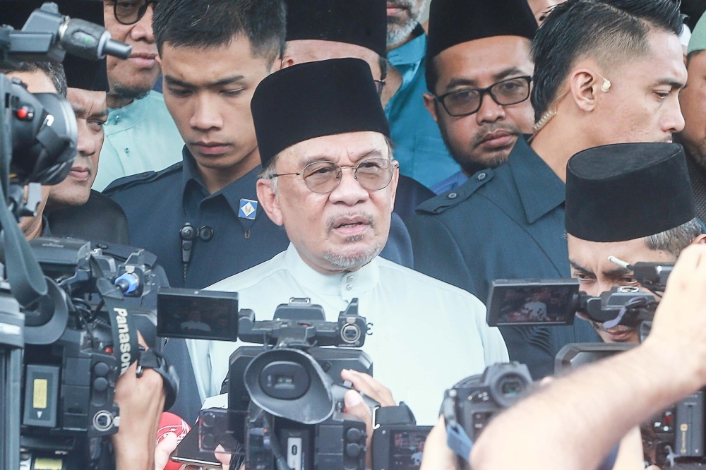 Anwar: Malaysia committed to net zero by 2050, carbon tax starting next year