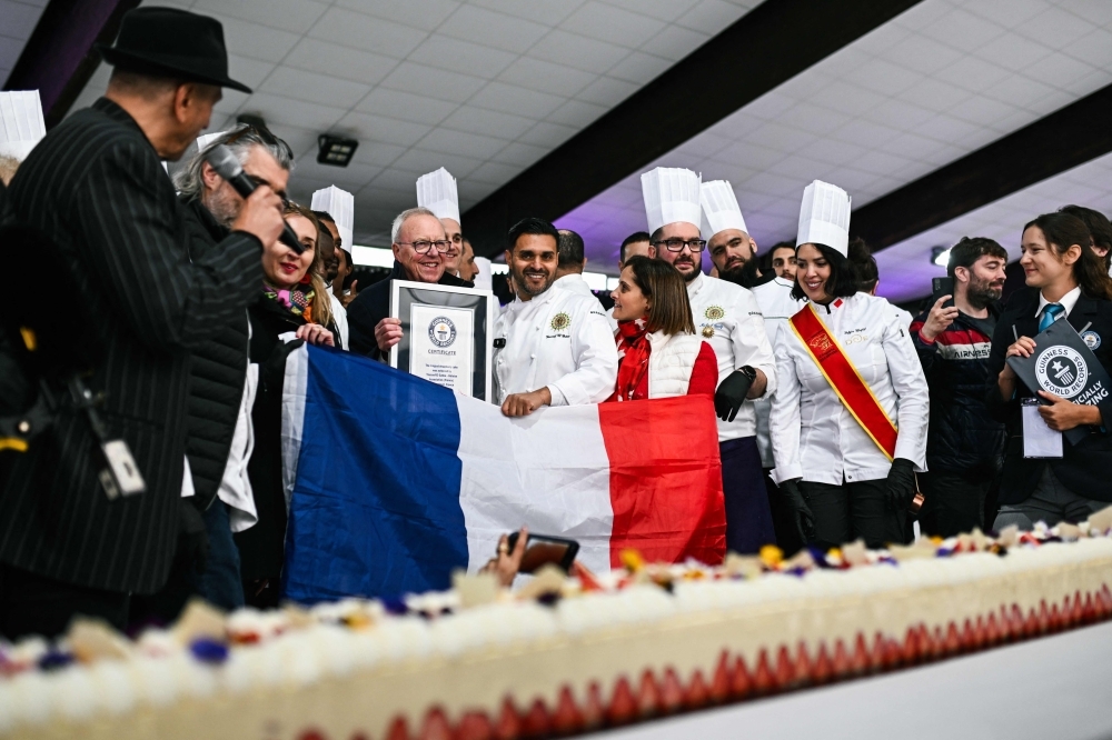 World's longest strawberry cake: French pastry chefs break record with 121-metre-long masterpiece