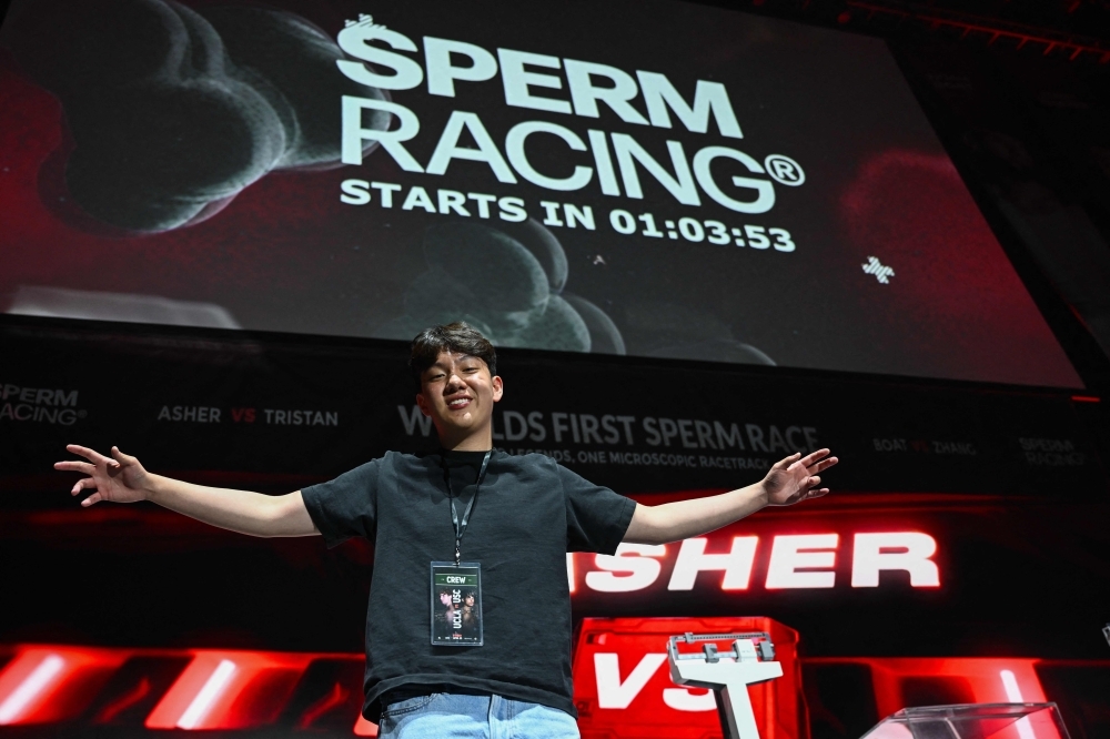 Sperm speedway: LA crowd cheers microscopic race in wild fertility awareness stunt