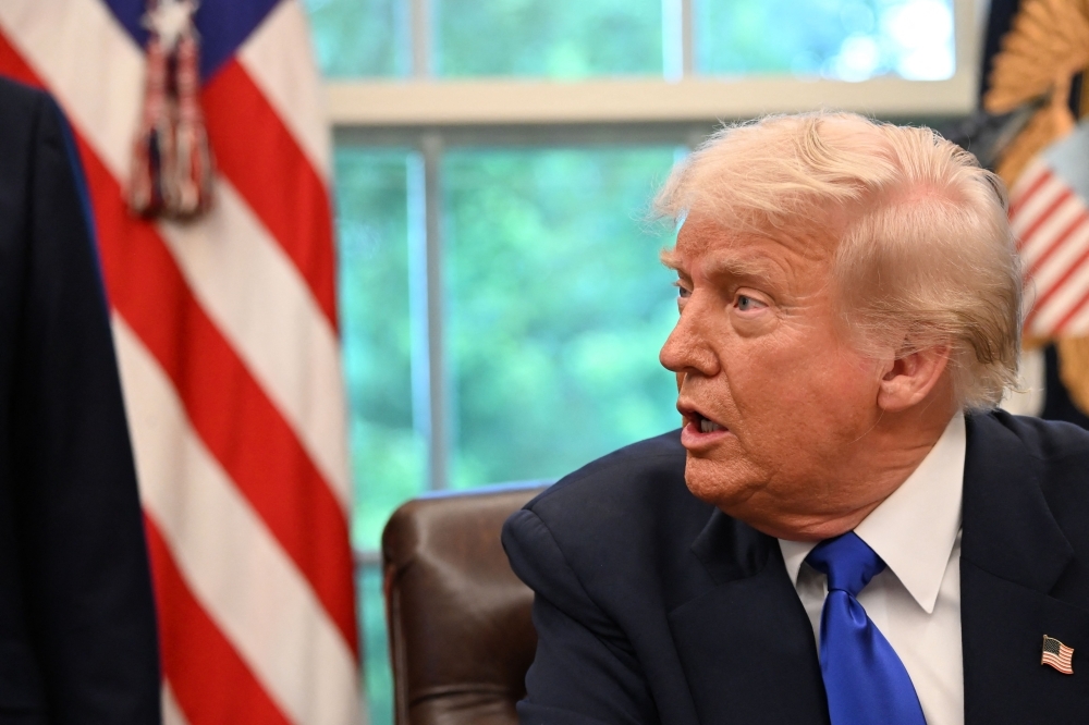 Trump curbs funding to foreign virus research he blames for Covid-19 pandemic