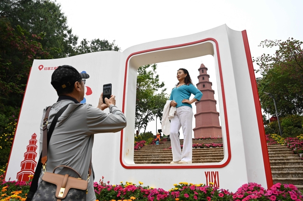 Tourists and tar in Yuxi, a town built on cigarettes in China's tobacco heartland