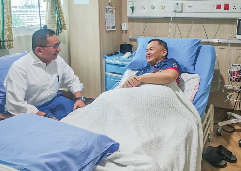 Religious affairs minister's condition improves after hospitalisation for food poisoning