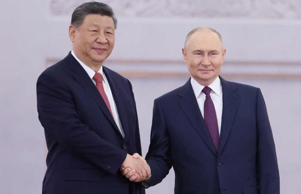 China vows to stand with Russia in face of ‘hegemonic bullying'