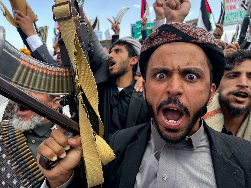 Israel warns Yemenis to flee Houthi-run ports, vows more strikes after airport missile hit