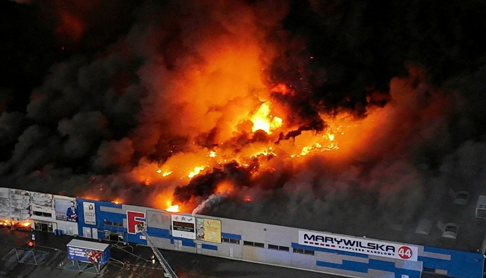 Poland boots Russian diplomats over shopping mall inferno in hybrid war showdown