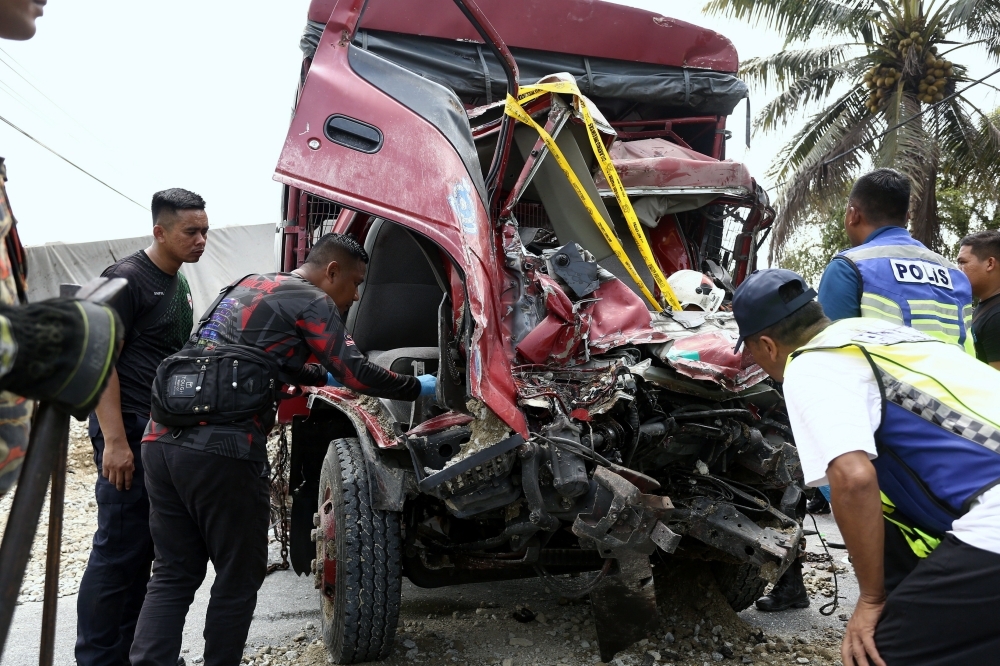 Teluk Intan deadly crash: DPM says stone-carrying lorry shouldn't have been on road, logistics firm must be held liable