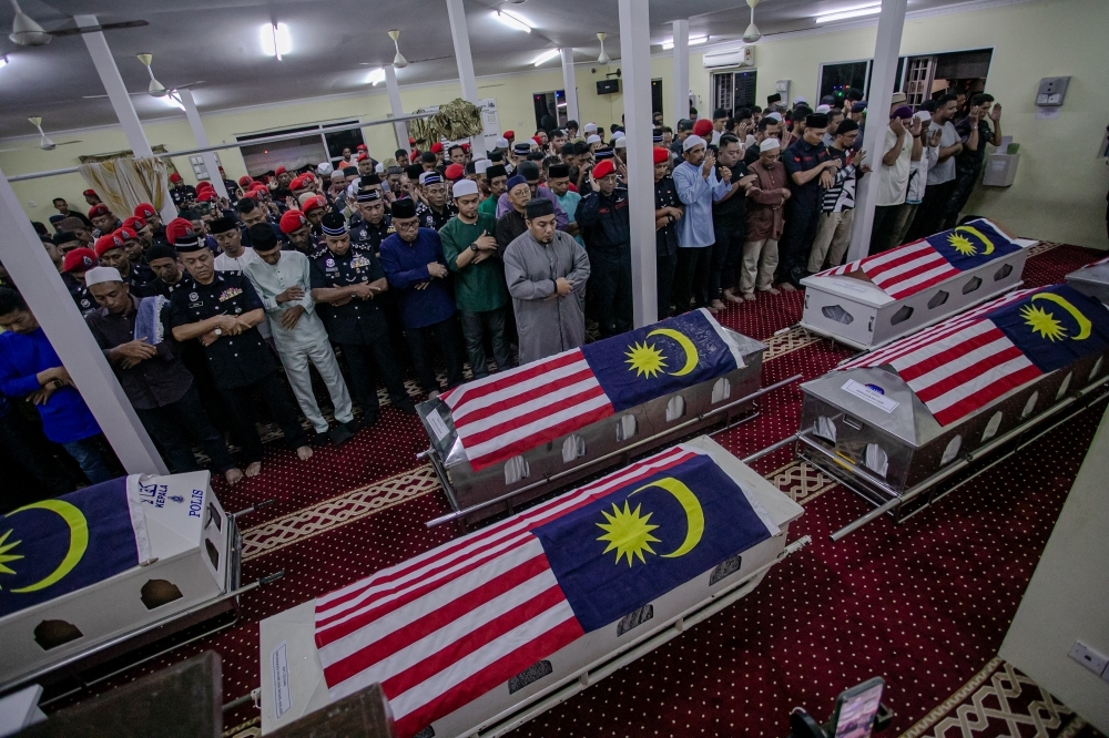 Jalur Gemilang-draped caskets mark final rites for nine FRU men killed in lorry crash