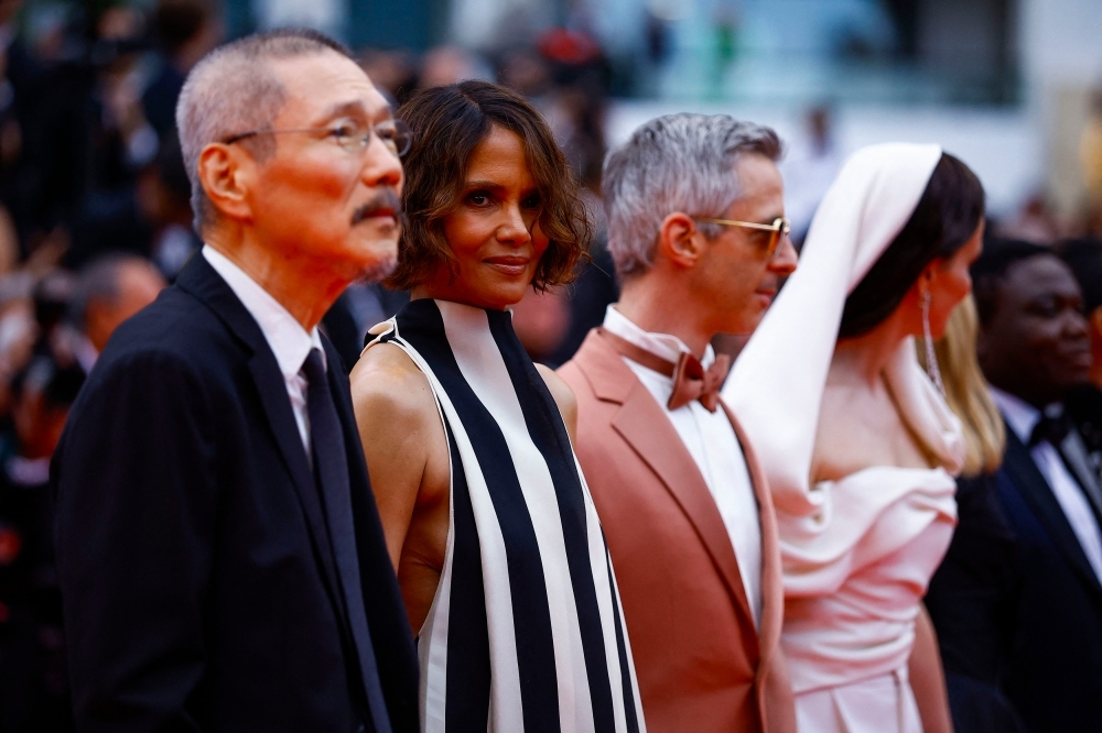 Halle Berry trips up on Cannes festival's new ‘no naked gowns' dress code