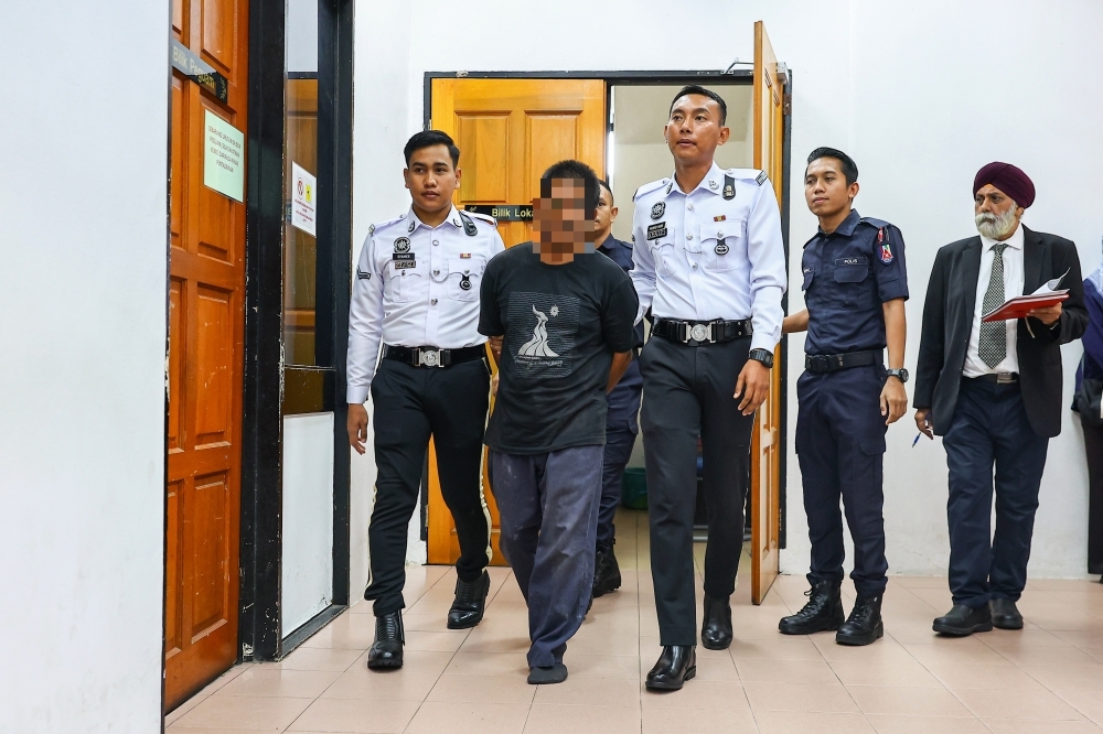 Lorry driver with six past convictions remanded over Teluk Intan crash that killed nine FRU officers