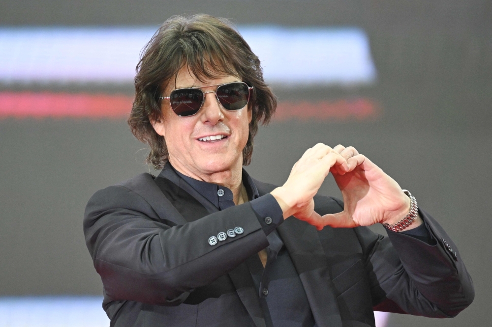 Tom Cruise drops into Cannes with stunts, spin, and spy games in ‘Mission: Impossible'