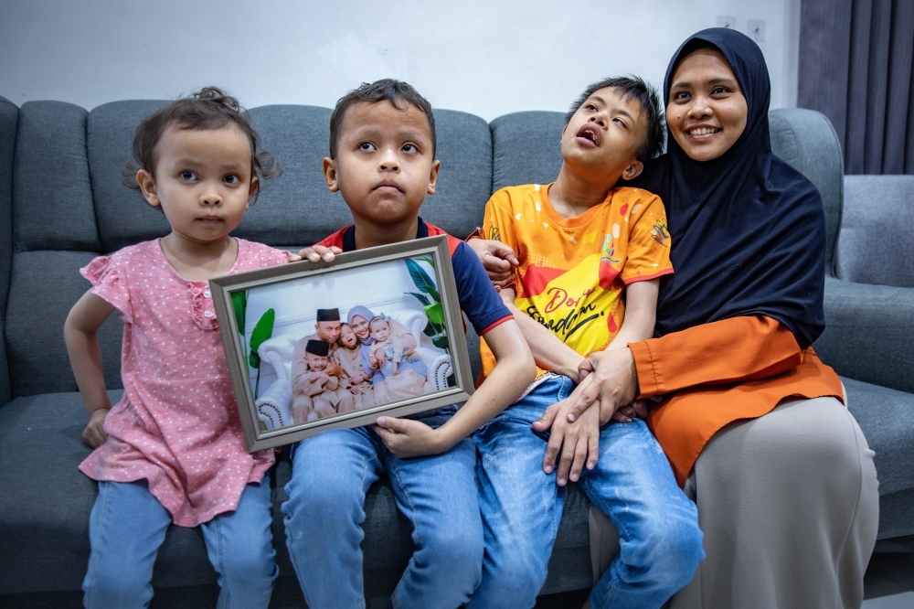 Daughter cries in her sleep every night, says widow of FRU personnel killed in Teluk Intan crash