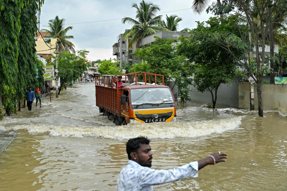 Torrential rains flood India's tech capital Bengaluru, killing at least one and exposing infrastructure flaws