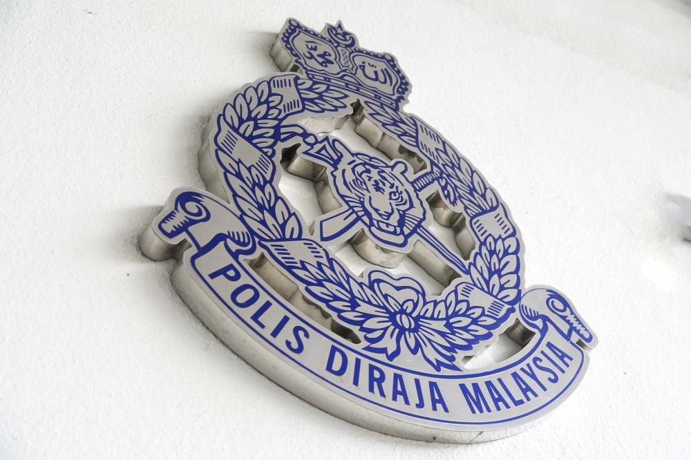 Johor police shoot dead robbery suspect after machete attack in Kluang