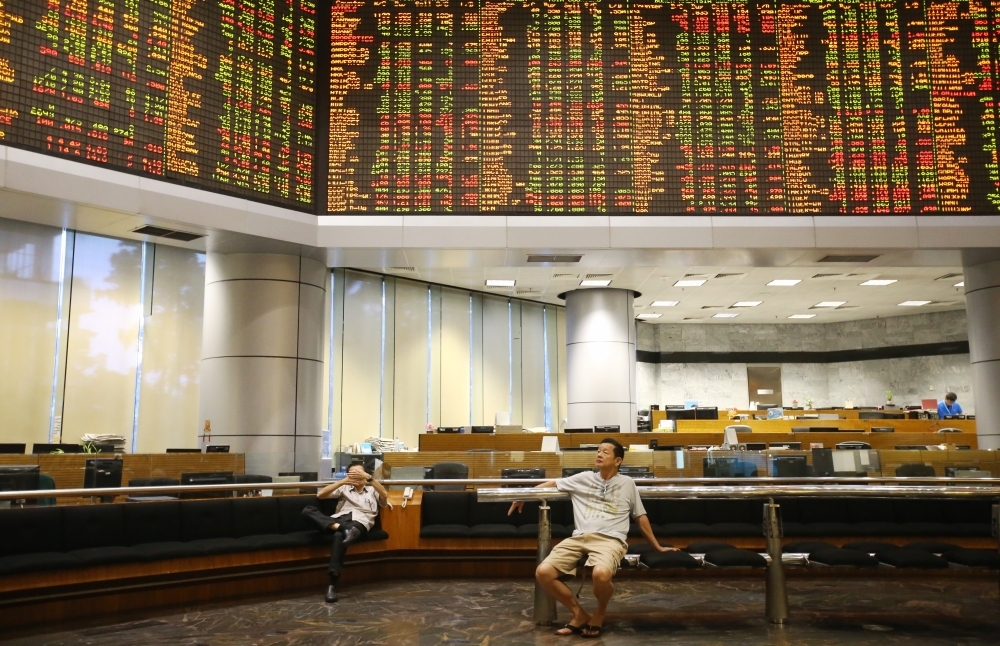 Bursa ends six-day losing streak as easing bond yields spark buying in financial counters