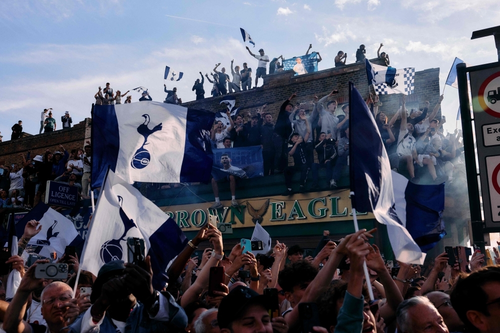 Tottenham parade Europa League trophy in north London as 150,000 fans celebrate end of 17-year drought