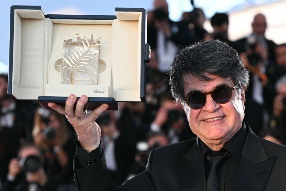 ‘What matters now is freedom': Banned filmmaker Panahi takes top Cannes prize with jail-inspired drama on revenge and resistance