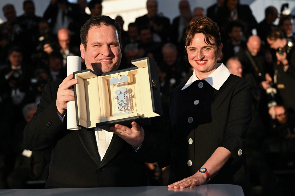 Iraqi director Hasan Hadi wins top Cannes debut prize for childhood tale set under Saddam's rule