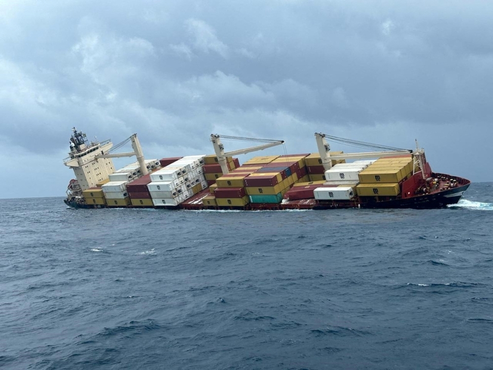 India races to contain oil spill after cargo ship with hazardous materials sinks off Kerala
