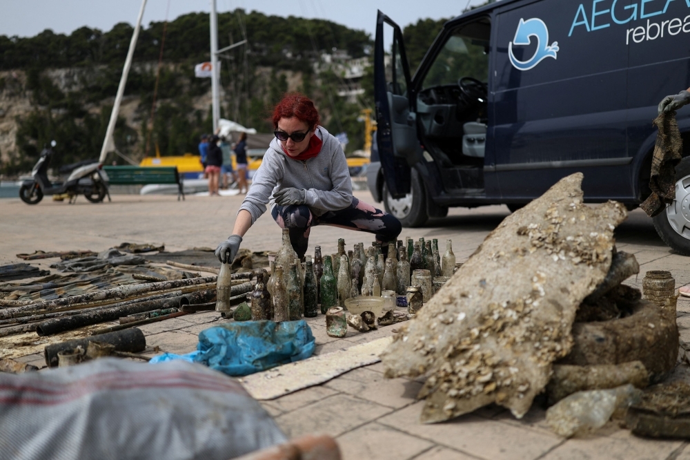 Greece's eco divers battle litter in Europe's largest marine park