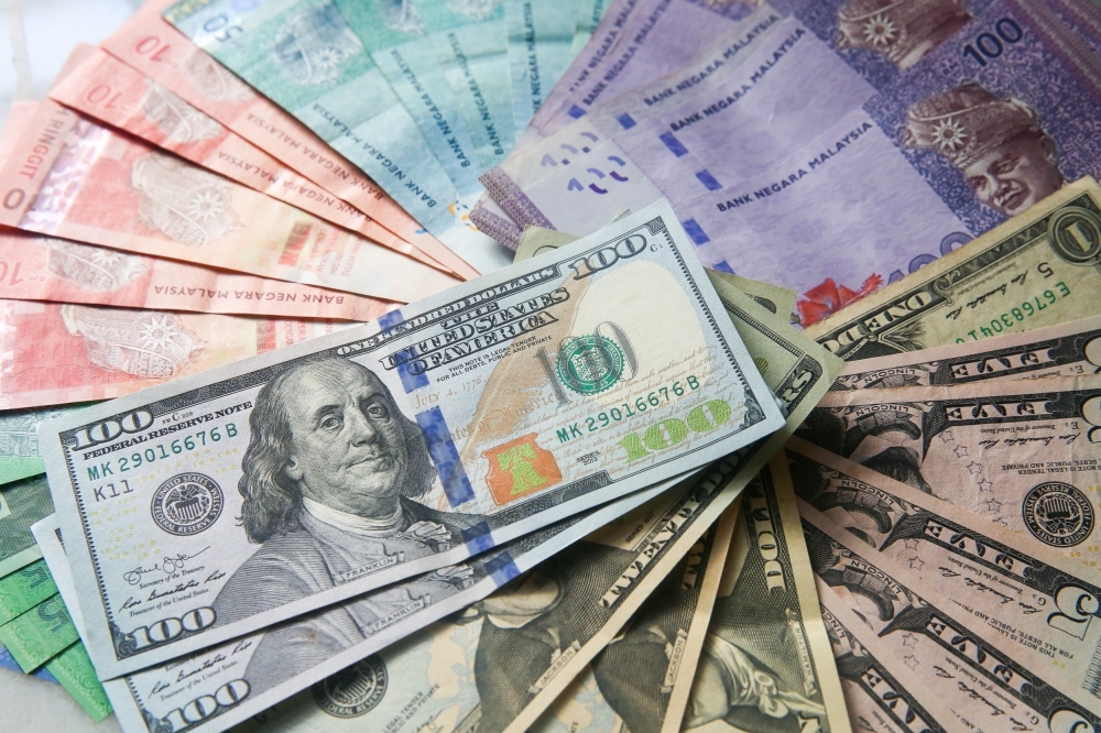 Ringgit slips against US dollar as US Fed flags inflation worries