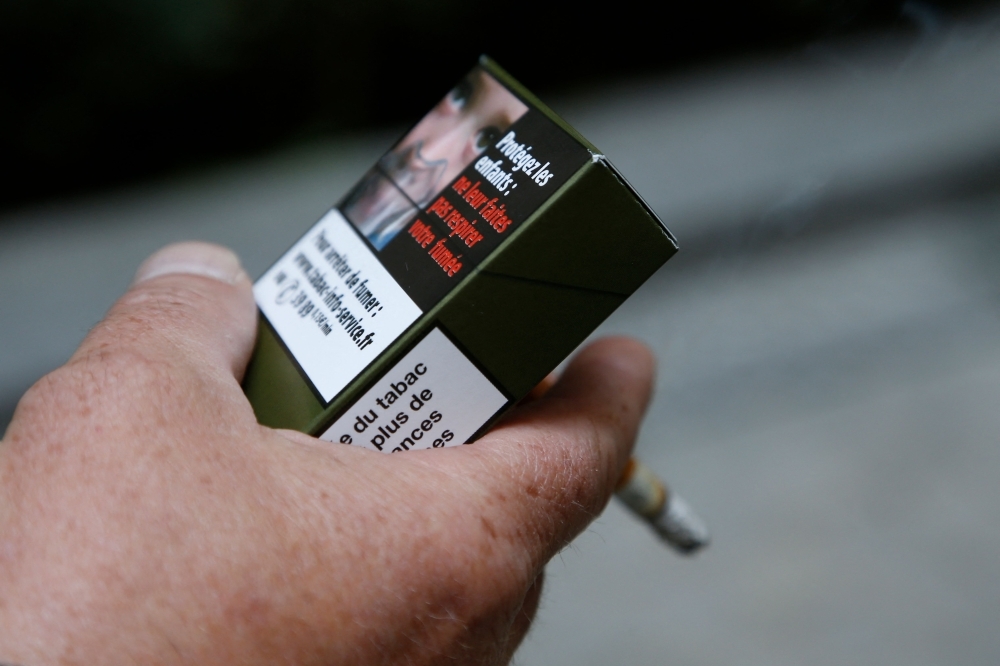 ‘Where there are children, tobacco must disappear': France bans smoking in parks, beaches and near schools from July 1
