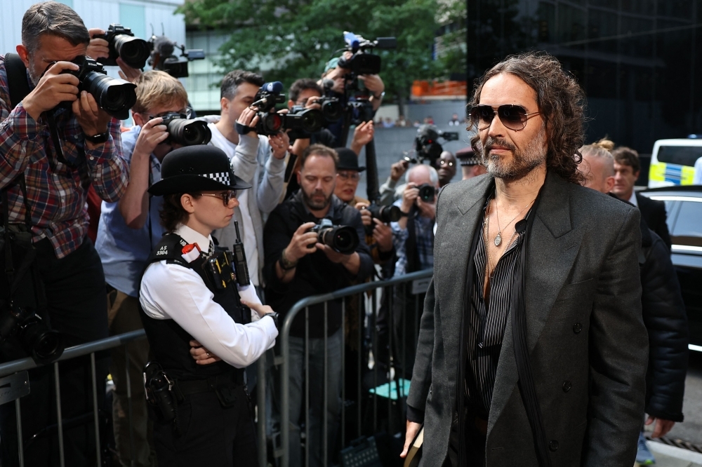 Comedian Russell Brand pleads not guilty to rape, sexual assault charges