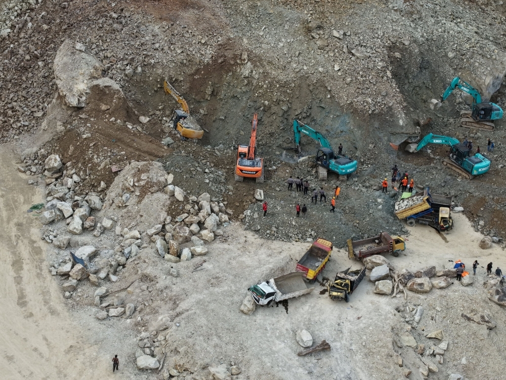 Rock collapse at Indonesia quarry kills at least 10, search for missing continues