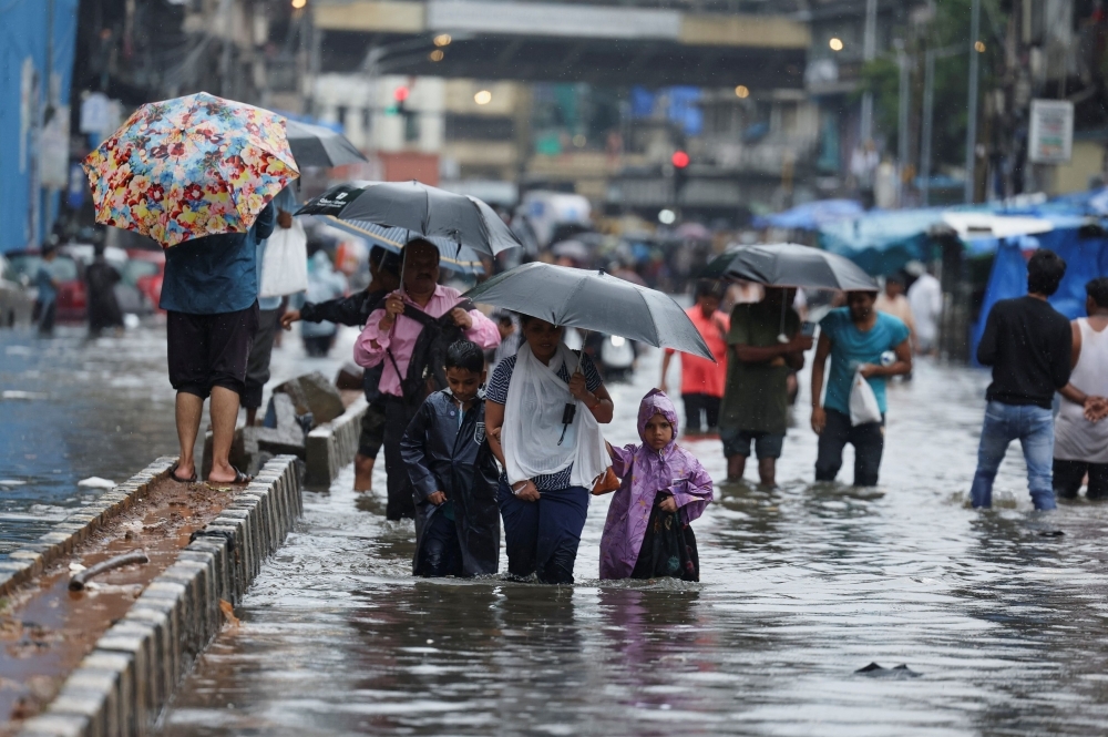 India monsoon floods kill five in Assam, trigger landslides and urban chaos as red alert issued