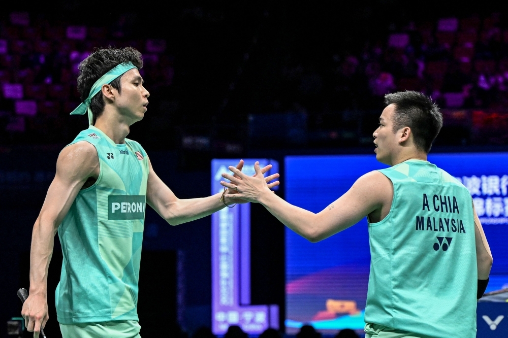 Third time's a charm: Aaron Chia-Soh Wooi Yik reign supreme in Singapore