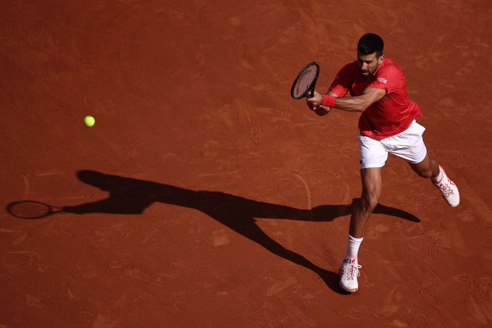 Djokovic, Sinner cruise into French Open quarters as world No. 361 Boisson stuns Pegula
