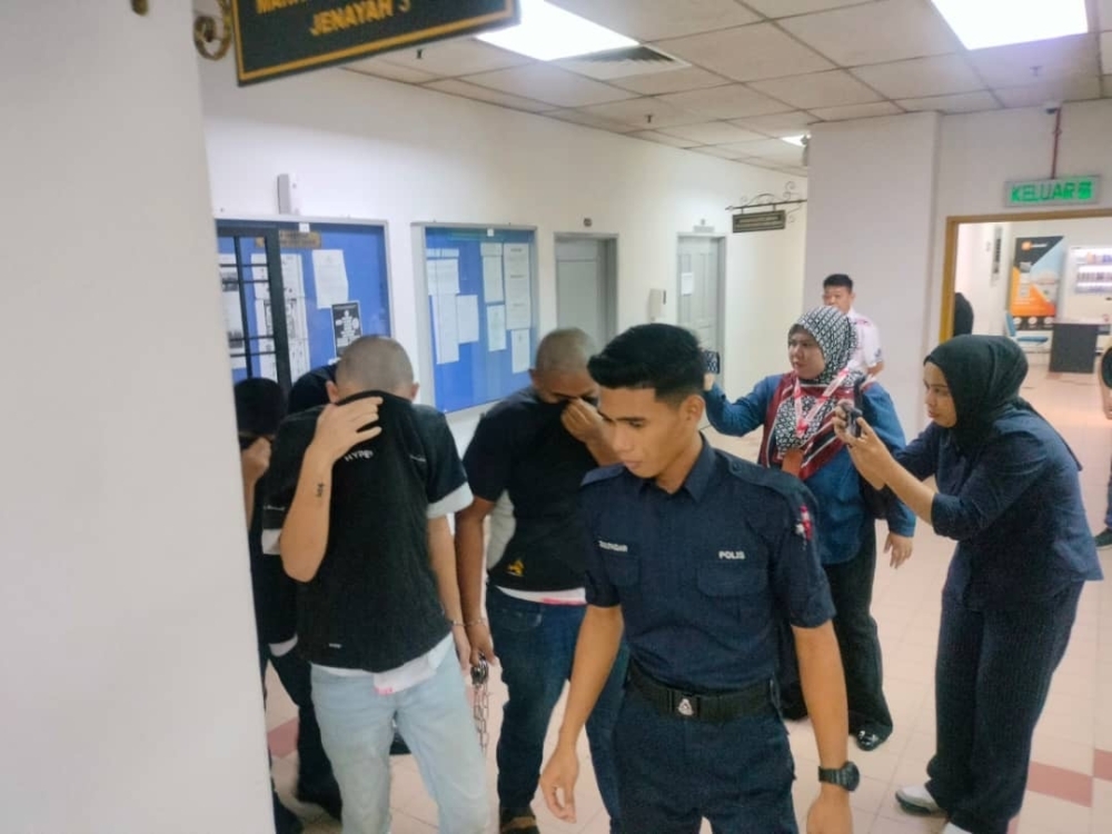 Eight youths, including woman dubbed ‘Bella', flip plea to not guilty in viral Johor honeypot assault case
