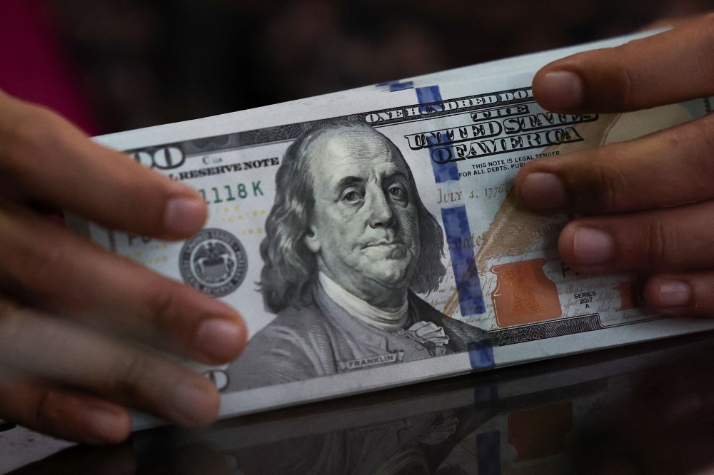 Ringgit inches up against dollar as weak US data shakes confidence