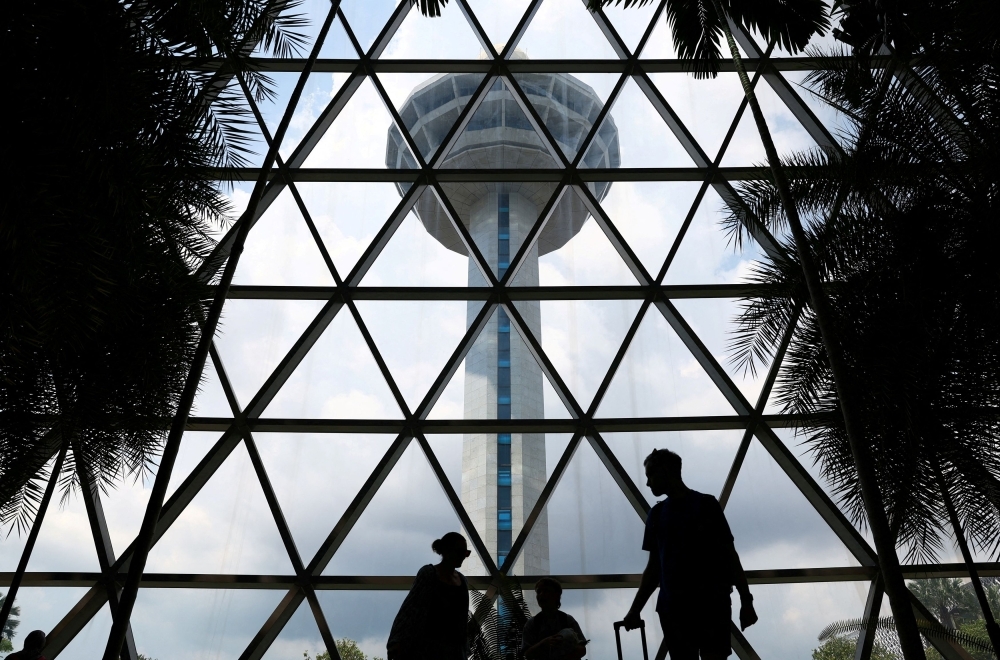 Singapore man charged over alleged bomb hoax on Etihad plane at Changi