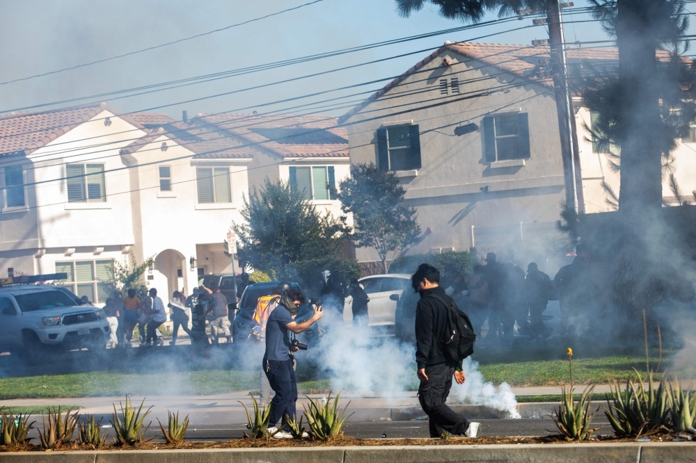 Los Angeles protests erupt for second day amid immigration raids, flash-bang grenades used