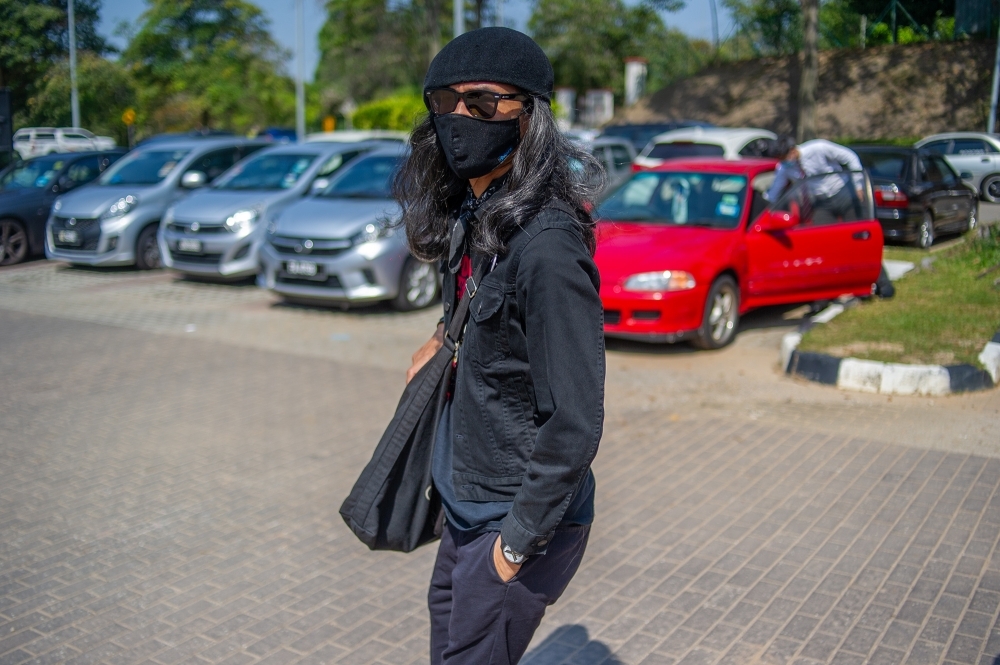 PM directs police to review travel restriction on activist Fahmi Reza