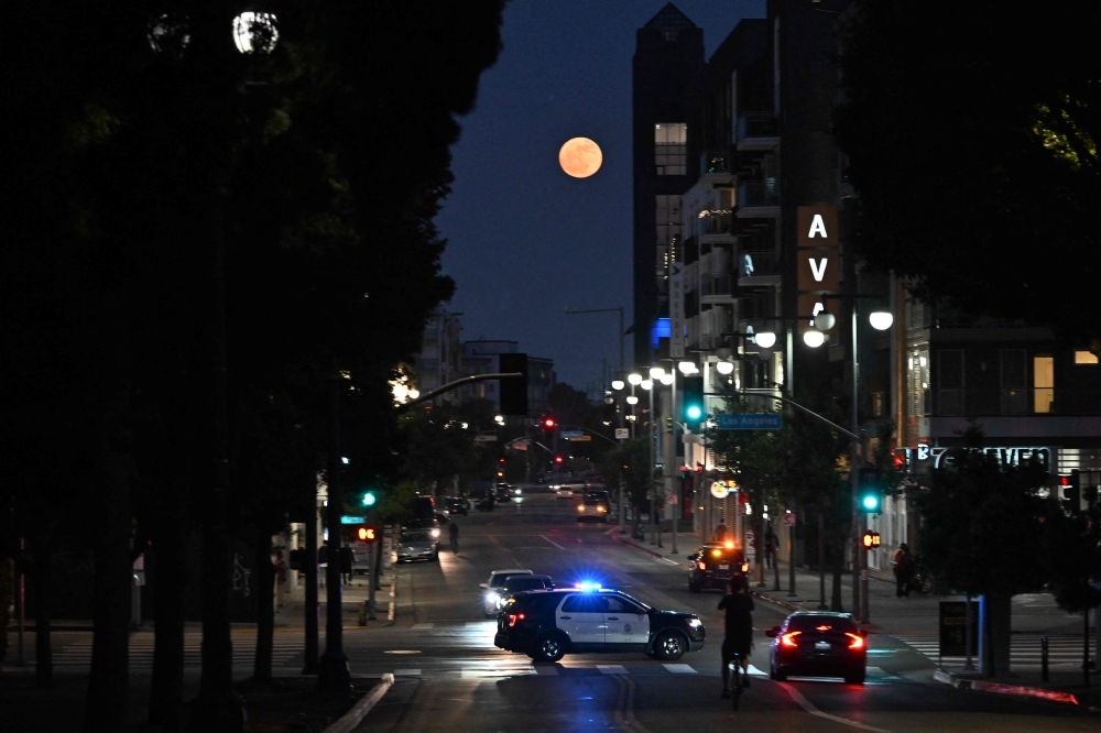 Los Angeles declares curfew as Trump decries protests as ‘foreign invasion'