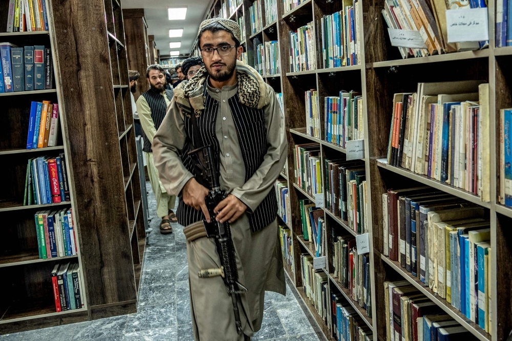 Taliban hang up Kalashnikovs to pen memoirs of Afghan war