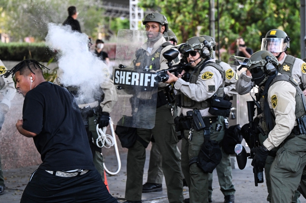 ‘Our city is not on fire': LA residents push back against Trump's rhetoric on protests amid military deployment