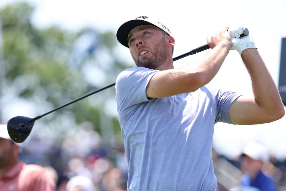 Burns leads US Open as McIlroy scrapes into weekend, DeChambeau eliminated