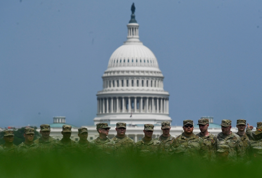 Protests, Middle East tensions and storms may rain on Trump's birthday parade