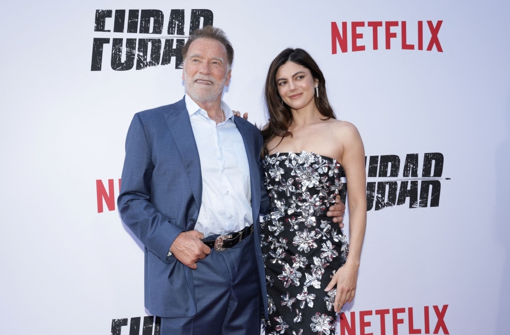 Schwarzenegger tangos back into action in Netflix's ‘Fubar' Season 2 with Carrie-Anne Moss (VIDEO)