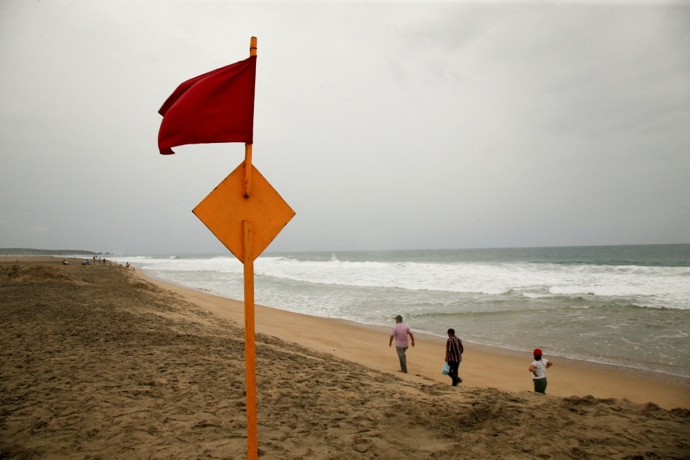 Hurricane Erick barrels toward Mexico's Pacific coast, bringing destructive winds, deadly floods and 10-metre waves