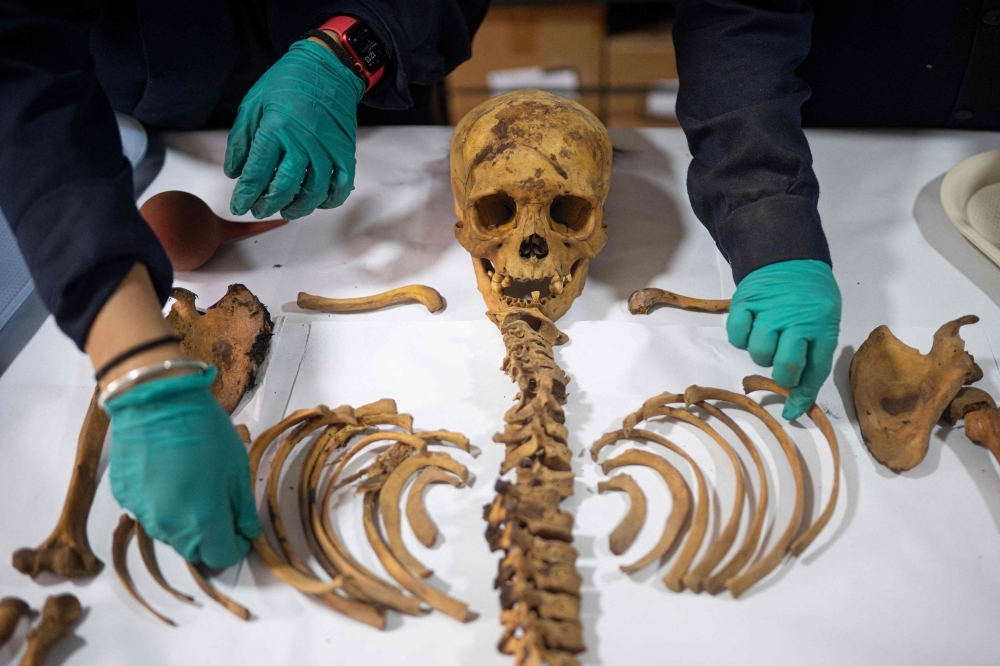 Peru gas workers unearth 1,000-year-old child mummy beneath Lima street