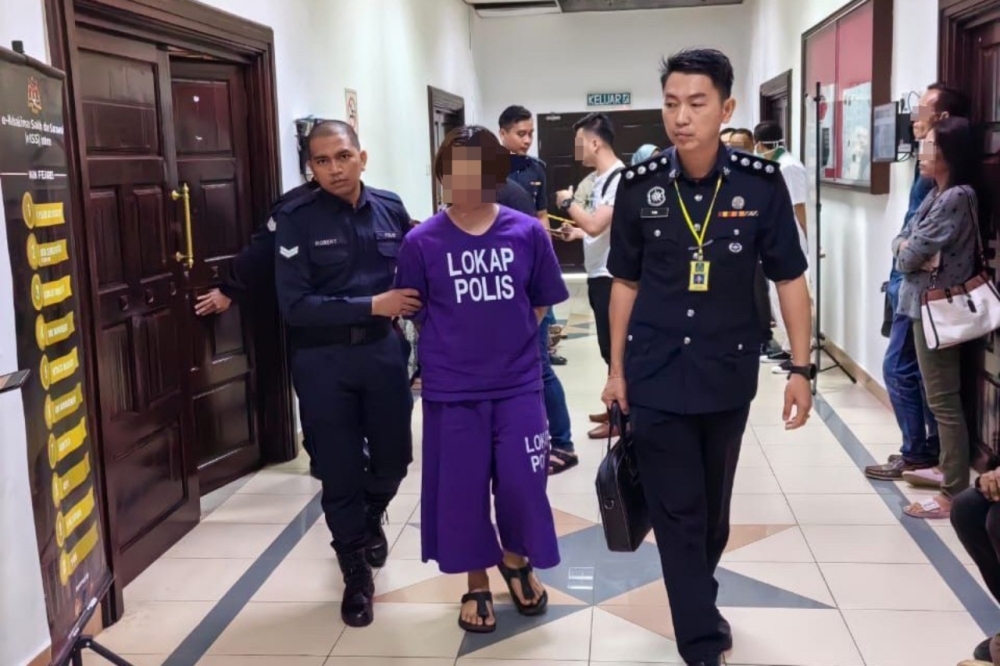 Kuching driver remanded three days after flashing airsoft gun at traffic light, tested positive for drugs