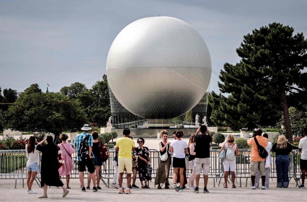 Paris's giant Olympic balloon is back, and it's here to stay for summer