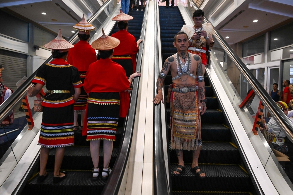 Colour, culture and calls for rights as Dayak parade lights up Kuching
