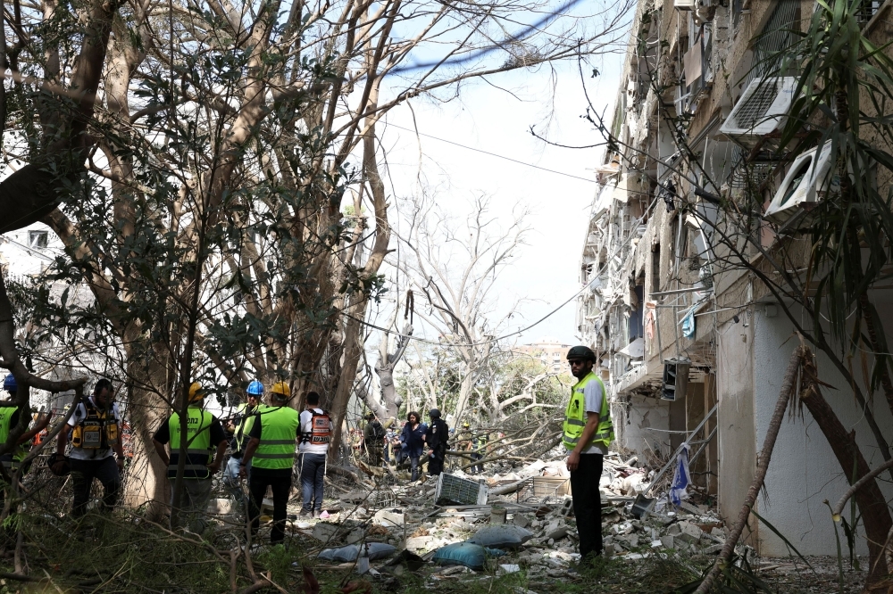 Air raid sirens across Israel as Iran vows to defend itself after US ‘obliterates' nuclear sites