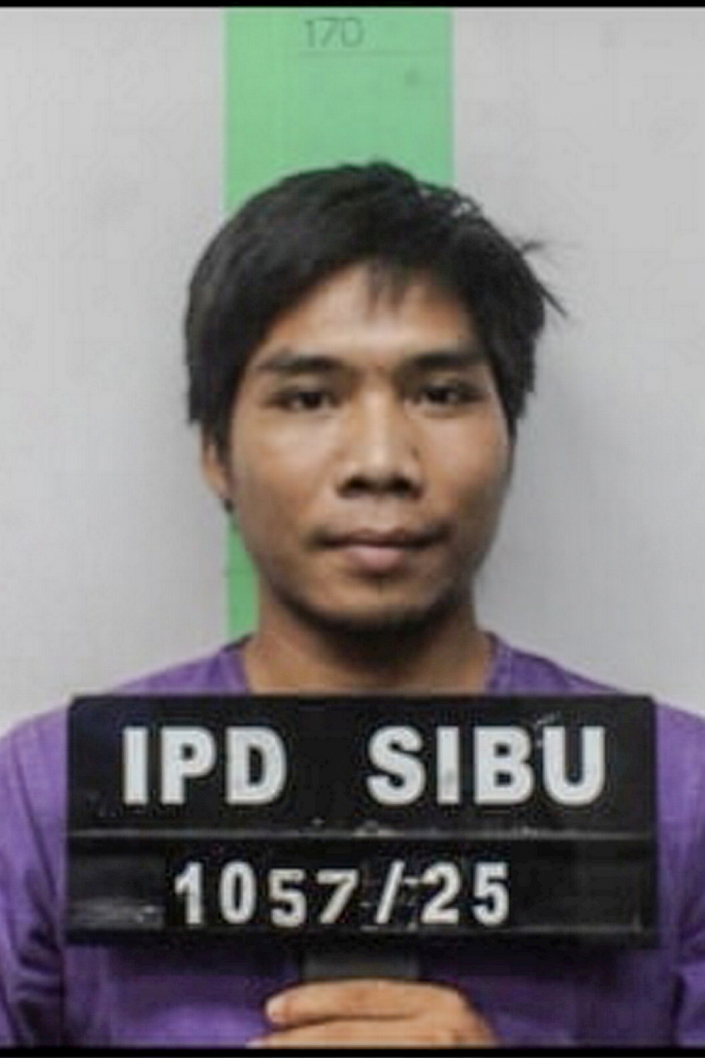 Sibu police launch manhunt after rape suspect escapes in handcuffs and purple lockup uniform