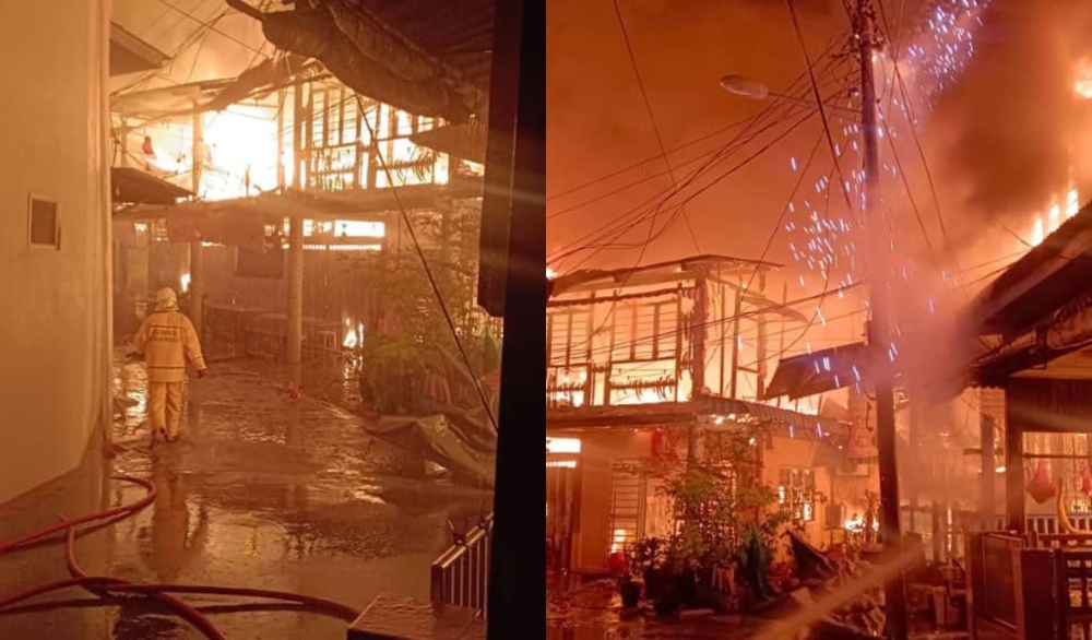 Pre-dawn blaze guts 21 houses, food stall and temple in Perak